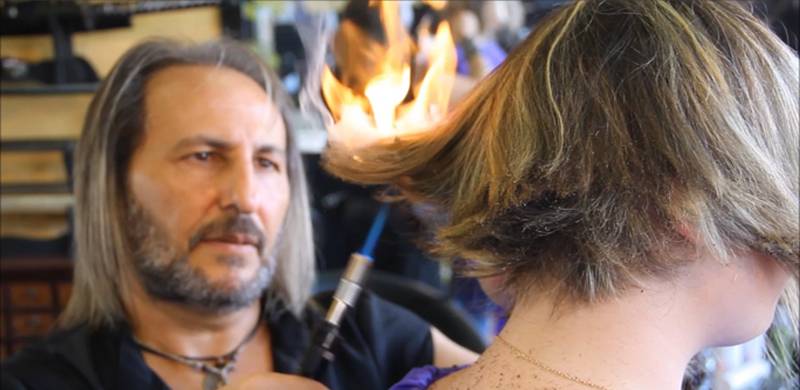 Swords and fire? This Spanish barber has a unique and scary way of giving you a haircut