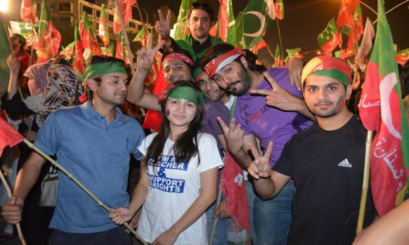 PTI workers carrying their flags