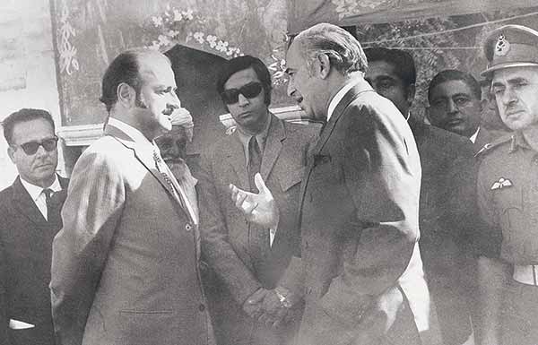 PM Bhutto (right) talking to Sindh CM outside Shah Latif’s shrine in 1973.